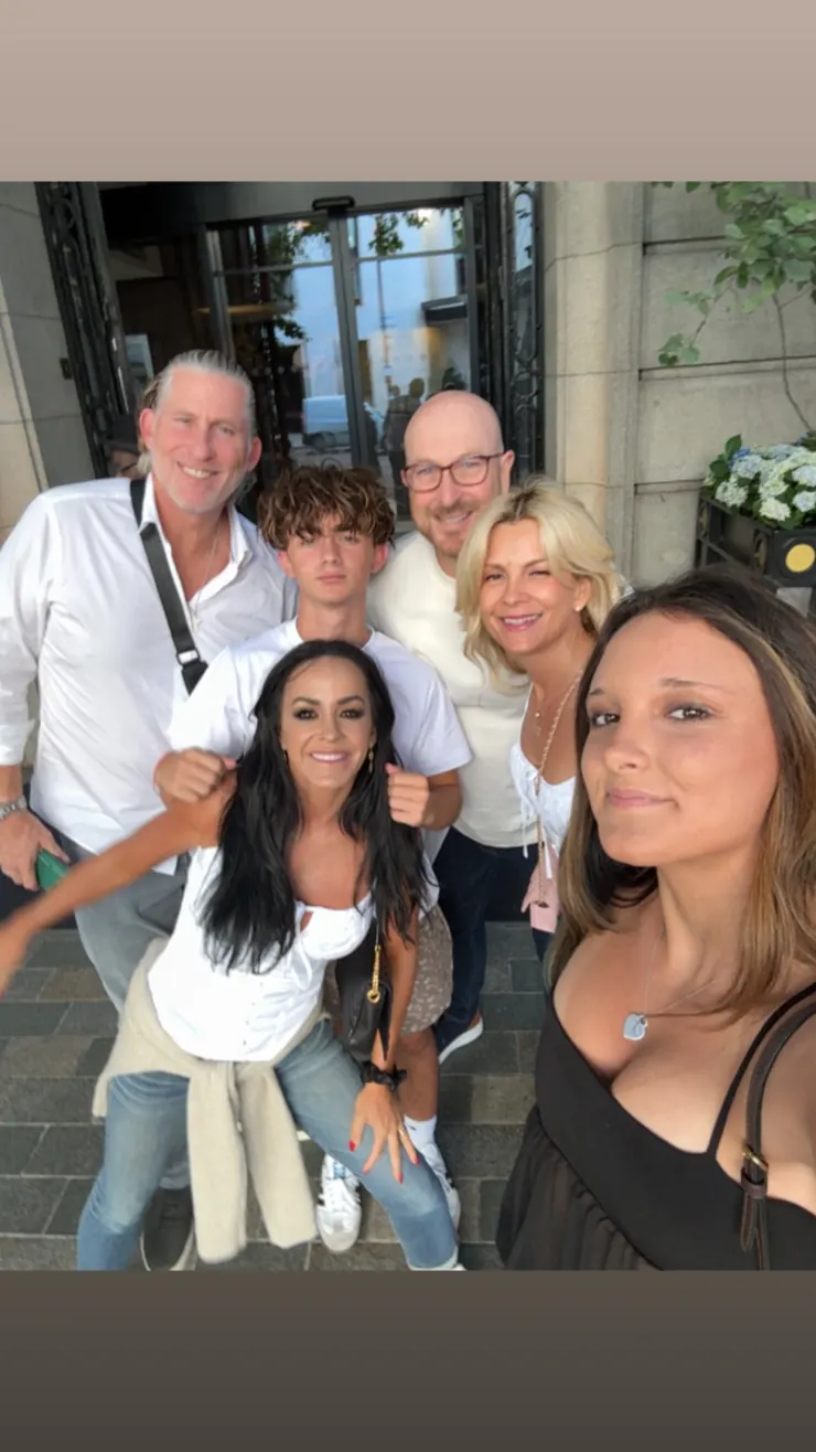 A family group photo outside the stadium before going in