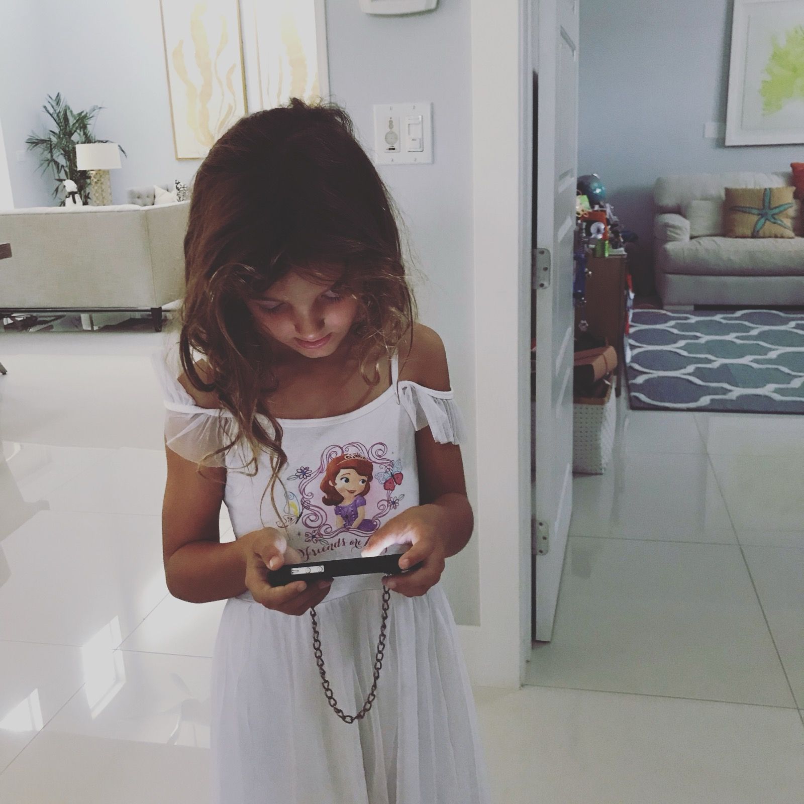 Six-year-old Ruby in a Sofia the First dress