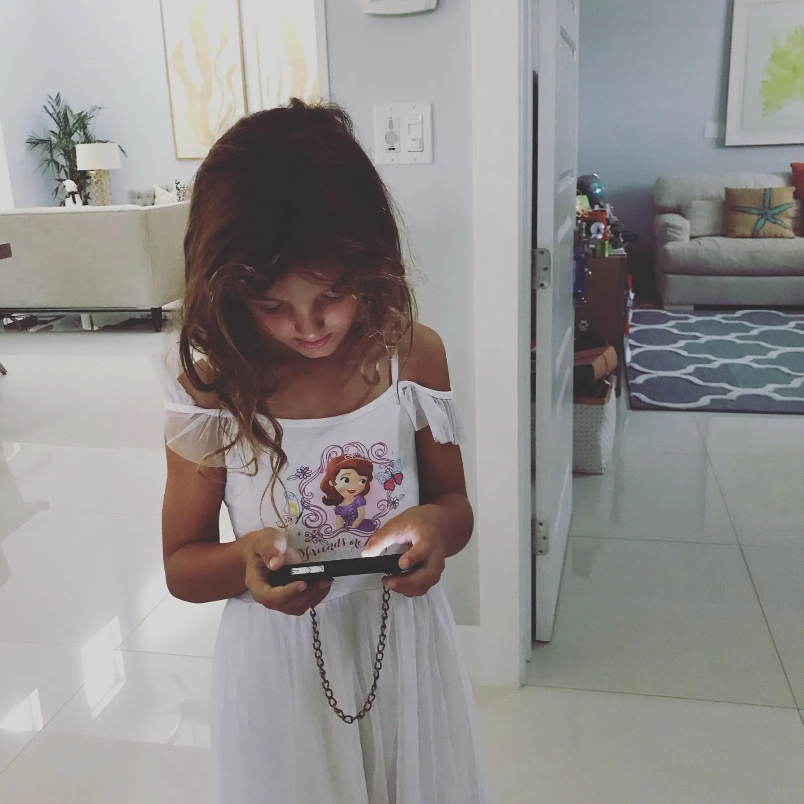 Six-year-old Ruby in a Sofia the First dress