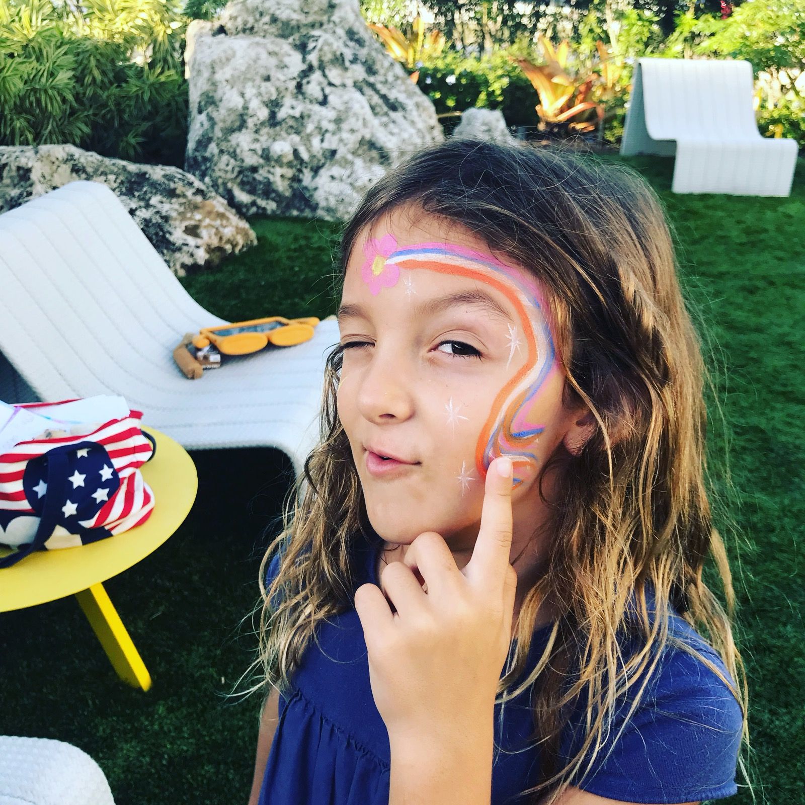 Ruby with rainbow face paint