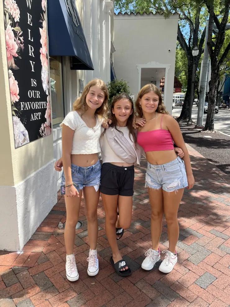Ruby and two friends dressed up in Miami