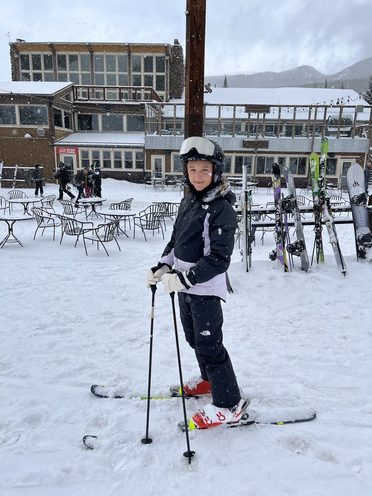 Ruby with poles in the ski village