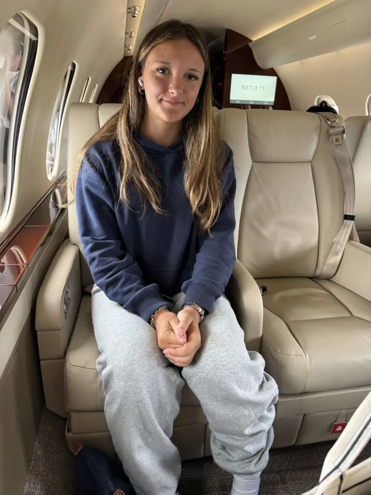 Ruby settled into her seat for the flight